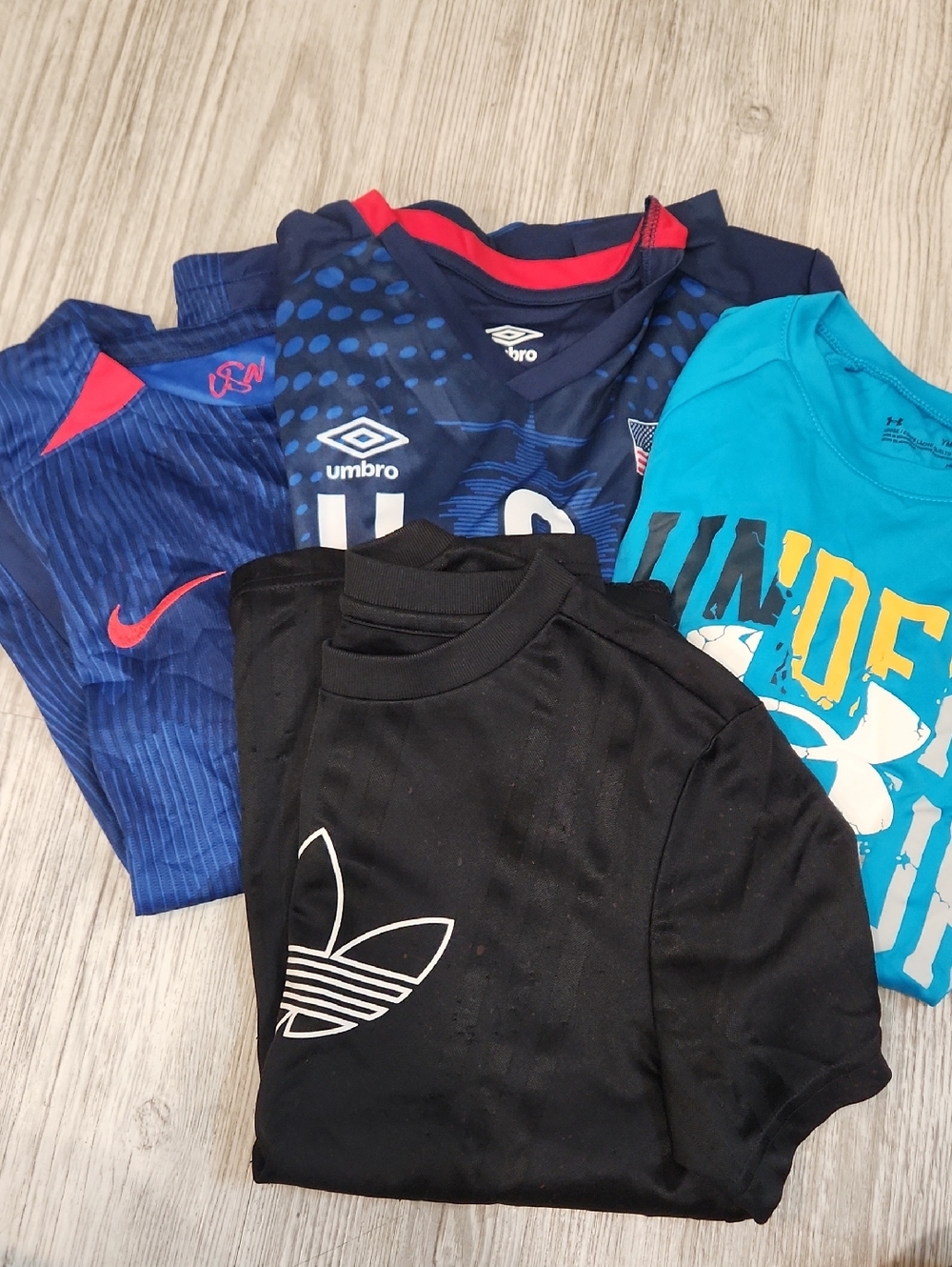 Nike, Addidas, Under Armour & Umbro Kids Tee Lot - Black, Navy & Teal